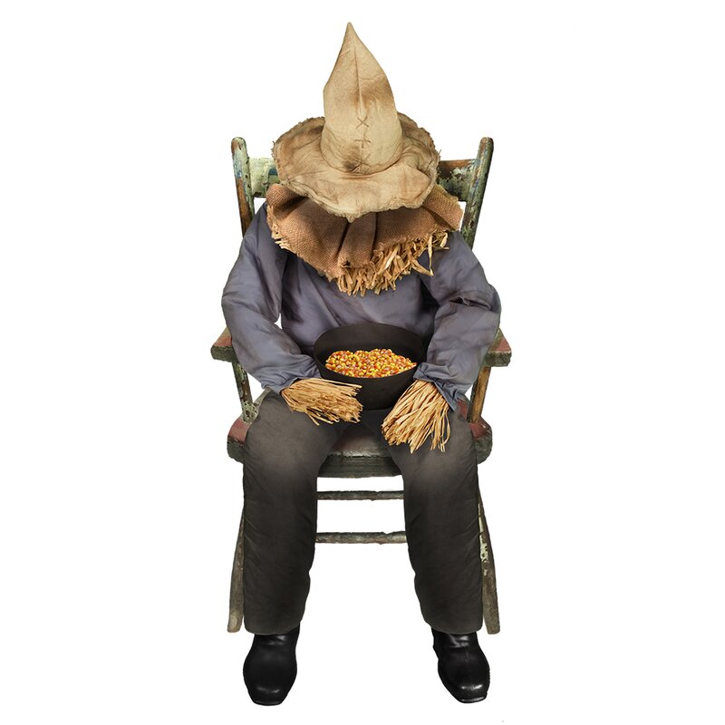 The Holiday Aisle® Sitting Scarecrow Wayfair